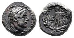Greek Lydia. Sardes, circa 2nd – 1st Century BC. AE (Bronze, 16.9 mm, 6.11 g.) Laureate bust of a young Herakles right, lion's skin tied around neck. Rev. ΣAPΔIANΩ[N], nude Apollo standing left, holdi