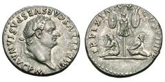 Titus. 79-81 AD. Denarius, 3.47g. (h). Rome, 80 AD. Obv: IMP TITVS CAES VESPASIAN AVG P M Head laureate right. Rx: TR P IX IMP XV COS VIII P P Trophy of arms between two seated captives; the captive o