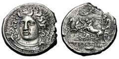 Sicily. Syracuse. 406/5 BC. Tetradrachm, 16.16g. (h). Obv: Three-quarter facing head of Arethusa, artist's signature ΚΙΜΩΝ on headband. Dotted border. Above, [ΑΡΕΘΟΣΑ]. Rx: Racing quadriga left, Nike 