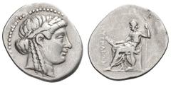 Ionia. Smyrna. c. 200 BC, concurrent with the earliest bronze Homereia. Drachm, 4.02g. (h). Obv: Laureate head of Apollo right. Border of dots. Rx: Homer seated left, himation draped over knees, holdi