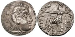NORTHEASTERN ARABIA. Third century BC. Silver tetradrachm (15.20 gm). Head of young Heracles right in lion skin headdress / Aramaic inscription, deity (Shams?) enthroned left, holding eagle on extende