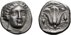 Greek Caria. Rhodes. c. 408/7-404 BC. Tetradrachm, 15.09g (12h). Obv: Head of Helios three-quarter facing with flowing hair. Rx: ΡΟΔΙΟΝ Rose with two buds and signed ΞENO in small letters between tend