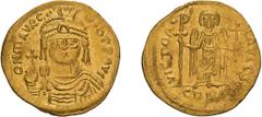 Byzantine Maurice Tiberius. Solidus. 582-602 AD. Solidus, 4.48g (6h). . , c. 583/4-602 AD. Obv: D N MAVRC - TIB PP AVG Draped and cuirassed bust facing, wearing plumed helmet, holding cross on globe i