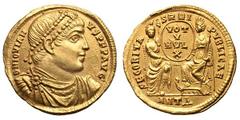 Jovian. (363-364 AD). Gold solidus (4.41 gm). Antioch. D N IOVIAN - VS P F P AVG, draped, cuirassed bust right, seen from front, wearing pearl diadem / SECORITAS (sic) REI PVBLICAE, Roma seated facing