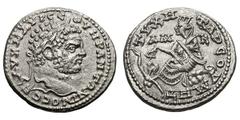 Caracalla. (198-217 AD). Silver didrachm (7.03 gm). Cilicia, Tarsus, Ca. 215 AD. AV K M AVP CE—OVHP ANTΩNINOC CE, head laureate right / TVXH TAPCOV MHT, city goddess, veiled and wearing crown of tower