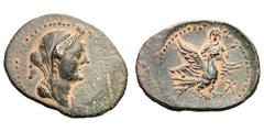Uncertain Asia Minor or Syrian mint. c. 1st century AD. Bronze, 2.99g. Obv: Female bust right, draped and veiled. Border of dots. Rx: Female figure, holding scepter, seated facing on eagle that is pre