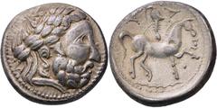 KELTEN KELTEN, DONAUKELTEN, IMIT. D. TETRAD. PHILIPPOS II. Tetradrachme. Typ mit Dreiecksornament. Barbarisierter belorbeerter Zeuskopf r. Rs: Stilisierter Reiter mit Helmschweif r. zwischen 2 Dreieck