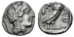 ATHEN. Tetradrachme. 479-404. Behelmter Athenakopf r. Rs: Eule r., dahinter Olivenzweig und Mondsichel. SNG COP. 32 ff. Svoronos Taf. 12-16. 16,8g. Hohes Relief. Min. korrodiert. Vs. kl. Prüfhieb. fas