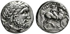 KELTEN DONAUKELTEN IMITATION DER TETRADRACHME PHILIPPOS II. Tetradrachme. Unmittelbare Nachprägung mit vollständiger Legende. Belorbeerter Zeuskopf r. Rs: Reiter mit Zweig r. Beizeichen Fackel. Monogr