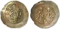 BYZANTINISCHE MÜNZEN MANUEL I. COMNENUS. 1143-1180. El-Aspron Trachy. Christus steht frontal zwischen 2 Sternen. Rs: Kaiser und der Hl. Theodor stehen frontal, halten zwischen sich Patriarchenkreuz au