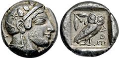 GRIECHISCHE MÜNZEN GRIECHISCHE MÜNZEN, GRIECHISCHES MUTTERLAND, ATTIKA, ATHEN. Tetradrachme. 479-ca. 450. Athenakopf mit attischem Helm r., auf dem Helmkessel Ranke und 3 Olivenblätter. Rs: Eule r., d