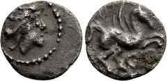 Greek Coins SPAIN. Emporion. Tetartemorion (Late 3rd-1st centuries BC). Gaulish-Iberian imitation. Obv: Male head right. Rev: Pegasos flying right; two circles below. ACIP 526. Rare Condition: Extreme