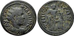 Roman Provincial Coins LYDIA. Tripolis. Philip I the Arab (244-249). Ae. Obv: AVT K M I ΦIΛIΠΠOC. Radiate, draped and cuirassed bust right. Rev: TPIΠOΛЄITΩN. Leto seated right on rock, suckling Apollo