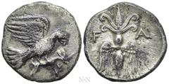 Greek Coins ELIS. Olympia. Drachm (134th-143rd Olympiad - circa 244-208 BC). Obv: Eagle flying right, tearing at hare held in talons. Rev: F - A. Thunderbolt with double volutes above and wings below.