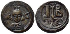 Byzantine Coins HERACLIUS (610-641). 12 Nummi. Alexandria. Obv: Draped and cuirassed bust facing, wearing crown surmounted by cross; eight-rayed star to left, crescent to right. Rev: Large IB; cross o
