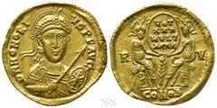 Roman Imperial Coins HONORIUS (393-423). GOLD Solidus. Ravenna. Obv: D N HONORIVS P F AVG. Diademed, helmeted and cuirassed bust facing slightly right, holding spear and shield decorated with christog