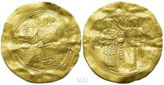 Byzantine Coins JOHN II COMNENUS (1118-1143). GOLD Hyperpyron. Constantinople. Obv: + KЄ ROHΘЄI / IC - XC. Christ Pantokrator seated facing on throne. Rev: Iω ΔЄCΠOTH. John standing facing, holding gl