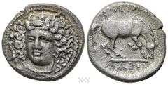 Greek Coins THESSALY. Larissa. Drachm (Circa 365-356 BC). Obv: Head of the nymph Larissa facing slightly left, with hair in ampyx. Rev: ΣΑΙΩΝ / ΛΑΡΙ. Horse standing right, preparing to lie down. Lorbe