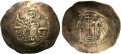 JOHN II COMNENUS (1118-1143). EL Aspron Trachy. Constantinople. Obv: IC - XC. Christ enthroned facing. Rev: +IW ΔΕCΠΟΤΗ / O ΓΕWPΓΙ. John and St. George standing facing, supporting between them patriar