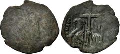 ANDRONICUS II PALEOLOGUS (1282-1328). Trachy. Thessalonica. Obv: Threequarter lenght figures of emperor amd St. Demetrius, holding long cross between them. Rev: Long cross on step with single wing to 