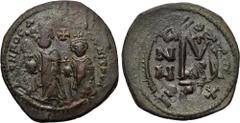 HERACLIUS, with HERACLIUS CONSTANTINE (610-641). Follis. Constantinople. Obv: Heraclius and Heraclius Constantine standing facing, each crowned and holding globus cruciger; between their heads, cross.