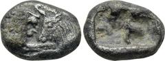 KINGS OF LYDIA. Kroisos (560-546 BC). 1/3 Siglos. Sardes. Obv: Confronted foreparts of lion left and bull right. Rev: Double incuse square punch. Rosen 666. Condition: Very fine. Weight: 1.65 g. Diame