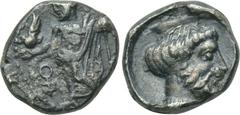 CILICIA. Tarsos. Tiribazos (Satrap of Lydia, 388-380). Obol. Obv: Baal standing left, holding eagle and sceptre; dynastic symbol to left. Rev: Head of Ahura-Mazda right, wearing kalathos. SNG France 2
