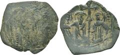 ANDRONICUS II PALEOLOGUS (1282-1328). Trachy. Thessalonica. Obv: Cross potent on step with single wing to left. Rev: Threequarter length figures of emperor with long beard and St. Demetrius, holding s