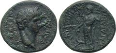 LYDIA. Sardes. Nero (54-68). Ae. Mindios, magistrate. Obv: NEPΩN KAIΣAP. Laureate head right. Rev: EΠΙ ΜΙΝΔΙΟΥ ΣΑΡΔΙΑΝΩΝ / ΣΤΡΑ ΤΟ Β. Dionysos standing left, holding thyrsos and pouring wine out of ka