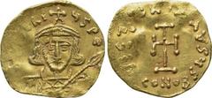 TIBERIUS III APSIMAR (698-705). GOLD Tremissis. Constantinople. Obv: D TIbERIVS PE AV. Crowned and cuirassed facing bust, holding spear and shield with horseman motif. Rev: VICTORIA AVGVS / CONOB. Cro