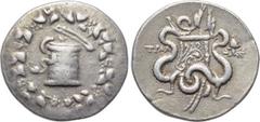 LYDIA. Tralleis. Cistophor (Circa 166-160 BC). Obv: Cista mystica with serpent; all within ivy wreath. Rev: Bow case between two serpents. Controls: city-monogram in left field, helmet on thunderbolt 