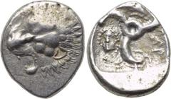 DYNASTS OF LYCIA. Perikles (Circa 380-360 BC). 1/3 Stater. Obv: Facing lion's scalp. Rev: Triskeles; dolphin in upper field, female facing head in lower left field. SNG Copenhagen -; SNG von Aulock -;