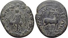LYDIA. Hierocaesaraea. Pseudo-autonomous (1st-2nd centuries AD). Ae. Obv: Artemis standing left, holding bow and resting hand on stag standing left; all within wreath. Rev: IЄPOKAICAPЄΩN. Stag standin
