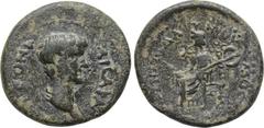 LYDIA. Mostene. Nero (54-68). Ae. Obv: NE(P)ONA KAICAPA. Bare head right. Rev: EΠI MEΔANIOY MOCTHNΩN. Goddess seated left, holding corn ears and double axe. . Condition: Very fine. Weight: 2.39 g. Dia