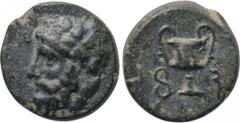 LYDIA. Uncertain (Sardes?). Ae (4th century BC). Obv: Head of Dionysos left, wearing ivy wreath. Rev: F - S (in Lydian). Kantharos. Vögtli, Pergamon 524; CNG 100, lot 1487; Gitbud & Naumann 34, lot 12