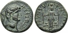 LYDIA. Philadelphia. Titus (Caesar, 69-79). Ae. Obv: TITOC KAICAP. Laureate head right. Rev: ΦΛΑΒΙΩN ΦΙΛΑΔΕΛΦΕΩΝ. Facing statue of female deity, with supports; lion to left and right. RPC II 1330. Ver