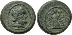 LYDIA. Blaundus. Ae (2nd-1st centuries BC). Obv: Laureate head of Zeus right. Rev: MΛAYN / ΔЄωN. Homonoia standing left, holding cornucopia and feeding serpent to left from patera. SNG von Aulock -; S