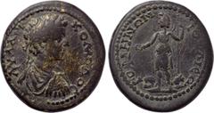 LYDIA. Gordus-Julia. Marcus Aurelius (177-192). Ae. Obv: ΑΥ Λ ΑΥΡ ΚΟΜΟΔΟС. Laureate, draped and cuirassed bust right. Rev: ΙΟVΛΙЄΩΝ ΓΟΡΔΗΝΩΝ. Mên standing left, holding patera and sceptre; lion to lef