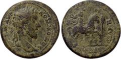 LYDIA. Mostene. Commodus (177-192). Ae. Obv: AVT K M AVP KOMMOΔOC. Laureate head right. Rev: MOCTHNΩN ΛVΔΩN. Hero (Apollo-Mên) riding horse right, holding bipennis; altar below raised foreleg; cypress