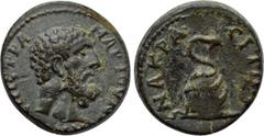 LYDIA. Nacrasa. Pseudo-autonomous. Time of Trajan or Hadrian (98-138). Ae. Mar. Iounianos, strategos. Obv: ЄΠI CTPA MAP IOVNIANOV. Bare and bearded head of Herakles right. Rev: NAKPACITΩN. Serpent coi