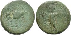 LYDIA. Tralles. Ae (2nd-1st centuries BC). Obv: Zeus standing facing, holding crowning Nike and sceptre; all within wreath. Rev: ΤΡΑΛΛΙ / ΑΝΩΝ. Bull standing right; c/m: Male head right within incuse 