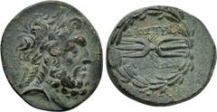 LYDIA. Tralles. Ae (2nd-1st centuries BC). Obv: Laureate head of Zeus right. Rev: ΔΙΟΣ ΤΡΑΛ / ΛΙΑΝΩΝ. Winged thunderbolt within wreath. SNG von Aulock -; SNG Copenhagen -; BMC -; M&M Deutschland 17, l