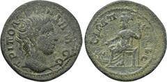 LYDIA. Tripolis. Pseudo-autonomous. Time of the Antonines (138-192). Ae. Obv: TPIΠOΛЄITΩN ΔHMOC. Bare head of Demos right. Rev: CAPAΠIC SЄVC. Zeus-Sarapis seated left on throne, holding patera and sce
