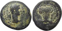 Roman Provincial Coins LYDIA. Philadelphia. Claudius (41-54). Ae. Chondros, magistrate. Obv: KΛAVΔIOC KAICAP. Bare head right. Rev: ΦΙΛAΔEΛΦEΩN XONΔPO. Grape bunch. RPC I Supp. 3039A. Extremely rare C