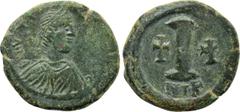 Byzantine Coins JUSTINIAN I (527-565). Decanummium. Nicomedia. Obv: D N IVSTINIANVS P P AVG. Diademed, draped and cuirassed bust right. Rev: Large I; cross to left and right; NIK. Sear 204. Condition: