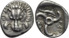 Greek Coins DYNASTS OF LYCIA. Perikles (Circa 380-360 BC). 1/3 Stater. Obv: Facing lion’s scalp. Rev: Triskeles; dolphin in upper field, female facing head in lower left field. SNG Copenhagen -; SNG v
