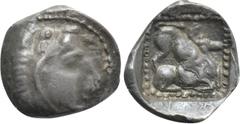 Greek Coins CYPRUS. Kition. Uncertain king (Circa 5th century BC). Hemiobol. Obv: Head of Herakles right, wearing lion skin. Rev: Lion right, attacking stag right; all within linear border. Cf. BMC 57