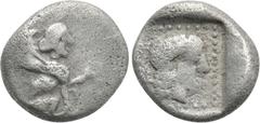 Greek Coins DYNASTS OF LYCIA. Uvug (Circa 470-440 BC). Obol. Uncertain mint. Obv: Sphinx seated right, raising forepaw. Rev: Female head right within pelleted square border; all within incuse square. 