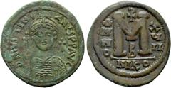 Byzantine Coins JUSTINIAN I (527-565). Follis. Nicomedia. Obv: D N IVSTINIANVS P P AVG. Helmeted, draped and cuirassed bust facing, holding globus cruciger and shield; cross in right field. Rev: Large