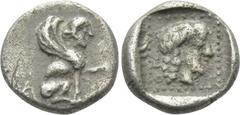 Greek Coins DYNASTS OF LYCIA. Uvug (Circa 470-440 BC). Obol. Uncertain mint. Obv: Sphinx seated right, raising forepaw. Rev: Female head right within pelleted square border; all within incuse square. 